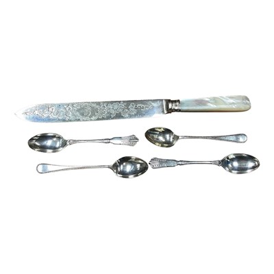 Lot 5285 - Two pairs of silver teaspoons and a silver bladed bread knife with mother of pearl handle