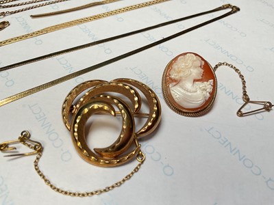 Lot 18 - 9ct gold mounted cameo brooch, one other 9ct gold brooch, 9ct gold necklace and a group of 9ct gold broken chains