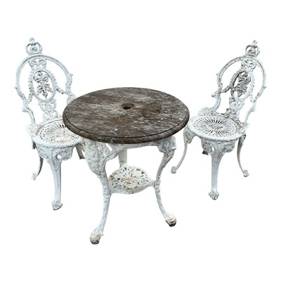 Lot 5319 - Victorian cast iron 'Britannia' pub table by Caskell & Chambers Ltd, Blackfriars Road, London, together with a pair of metal garden chairs, (3).