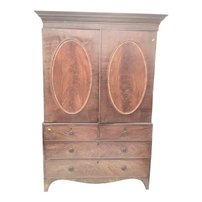 Lot 5313 - Nineteenth century mahogany linen press with five slides above enclosed by two panelled doors and four drawers below, 140cm wide, 66cm deep, 207cm high