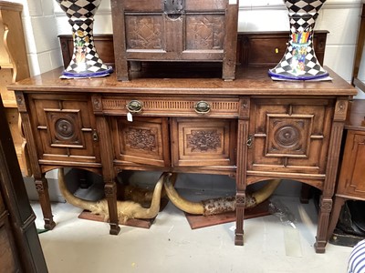 Lot 5318 - Early 20th century oak sideboard with raised ledge back, single drawer and four geometric panelled doors below, 183cm wide, 65cm deep, 122cm high