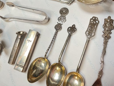 Lot 25 - Group of silver items to include an Edwardian novelty shoe, Victorian sovereign holder, tea strainer, fork, pair of sugar tongs, thimble etc, three Chinese silver teaspoons