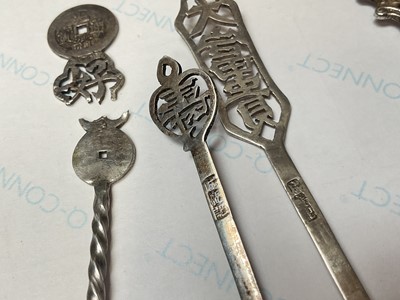Lot 25 - Group of silver items to include an Edwardian novelty shoe, Victorian sovereign holder, tea strainer, fork, pair of sugar tongs, thimble etc, three Chinese silver teaspoons