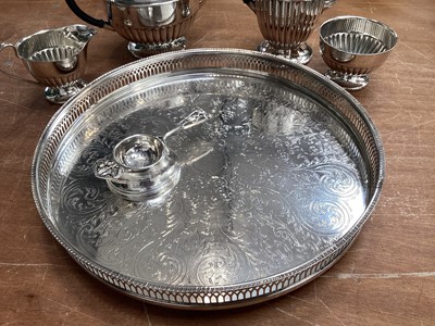 Lot 5083 - Silver plated four piece tea and coffee set, together with an Art Nouveau silver plated tea strainer and stand on a galleried silver plated tray
