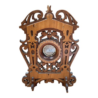 Lot 5069 - Continental silver pocket watch in carved wooden fretwork stand