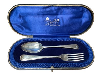 Lot 151 - Silver christening spoon and fork set in original fitted case (London 1918)