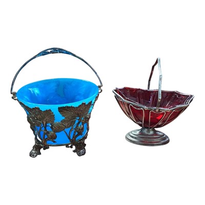 Lot 5093 - Two antique silver plated sugar baskets with turquoise and ruby glass liners