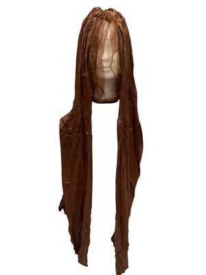 Lot Dunhill Edwardian lady's motoring veil in brown silk with brown silk chiffon face covering also Edwardian lady's motoring petticoat with chamois leather and silk taffeta pin pleats, embroidered...
