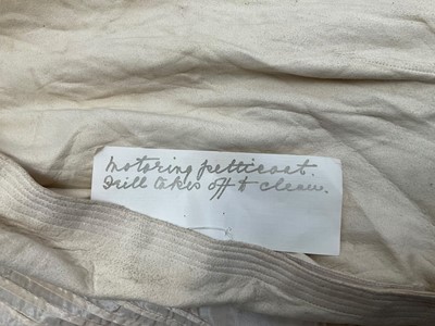 Lot 2507 - Dunhill Edwardian lady's motoring veil in brown silk with brown silk chiffon face covering also Edwardian lady's motoring petticoat with chamois leather and silk taffeta pin pleats, embroidered...