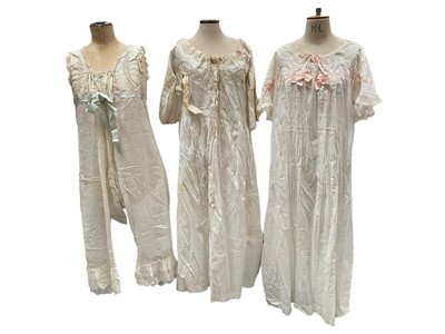 Lot 2509 - Victorian and Edwardian era lady's underwear including two open leg combinations with lace and ribbon trims, silk and lace nightie with shawl collar, two cotton and lace nighties, all fine quali...