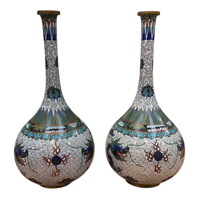 Lot 5125 - Pair of Chinese cloisonné bottle vases, decorated with dragons chasing a flaming pearl, 26cm high