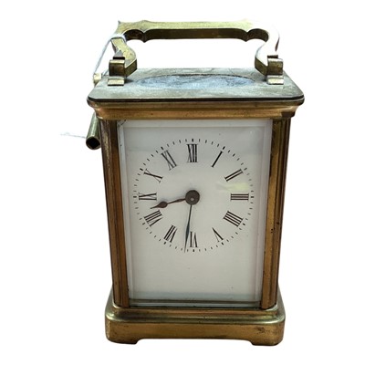 Lot 5124 - Brass cased carriage clock with key, enamel dial with Roman numerals, 11cm high