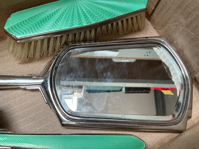 Lot 44 - Sterling silver mounted brush (stamped sterling 70) and a three piece silver plated and green guilloche enamel dressing table set