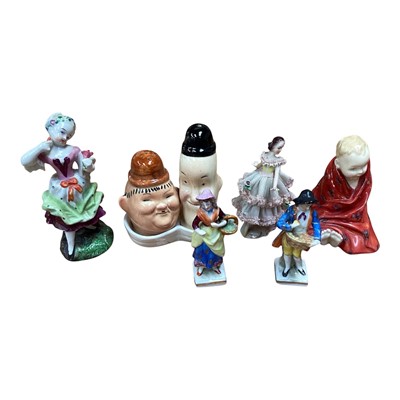 Lot 5142 - Small group of ceramic figures, including Royal Doulton 'This Little Pig', Beswick Laurel and Hardy salt and pepper, etc