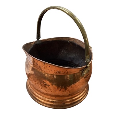 Lot 5151 - Antique copper coal scuttle and a leather covered lamp