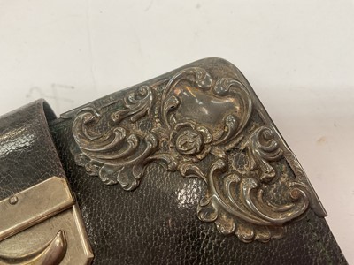 Lot 6 - Vintage Czechoslovakian paste set chatelaine mesh purse and an Edwardian silver mounted leather purse (2)
