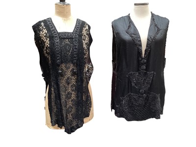 Lot 2515 - Two 1920s tabards, one is black silk with heavy beading the other is black lace with beading and tassels. Plus a Flapper dress, cream and silver beading on black and cream silk crepe