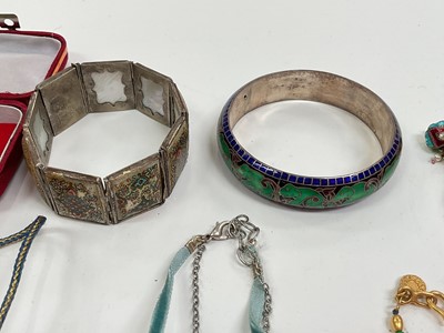 Lot 12 - Eastern white metal and enamel bangle with elephant decoration, white metal and enamel ring, together with other Eastern enamelled and beaded jewellery