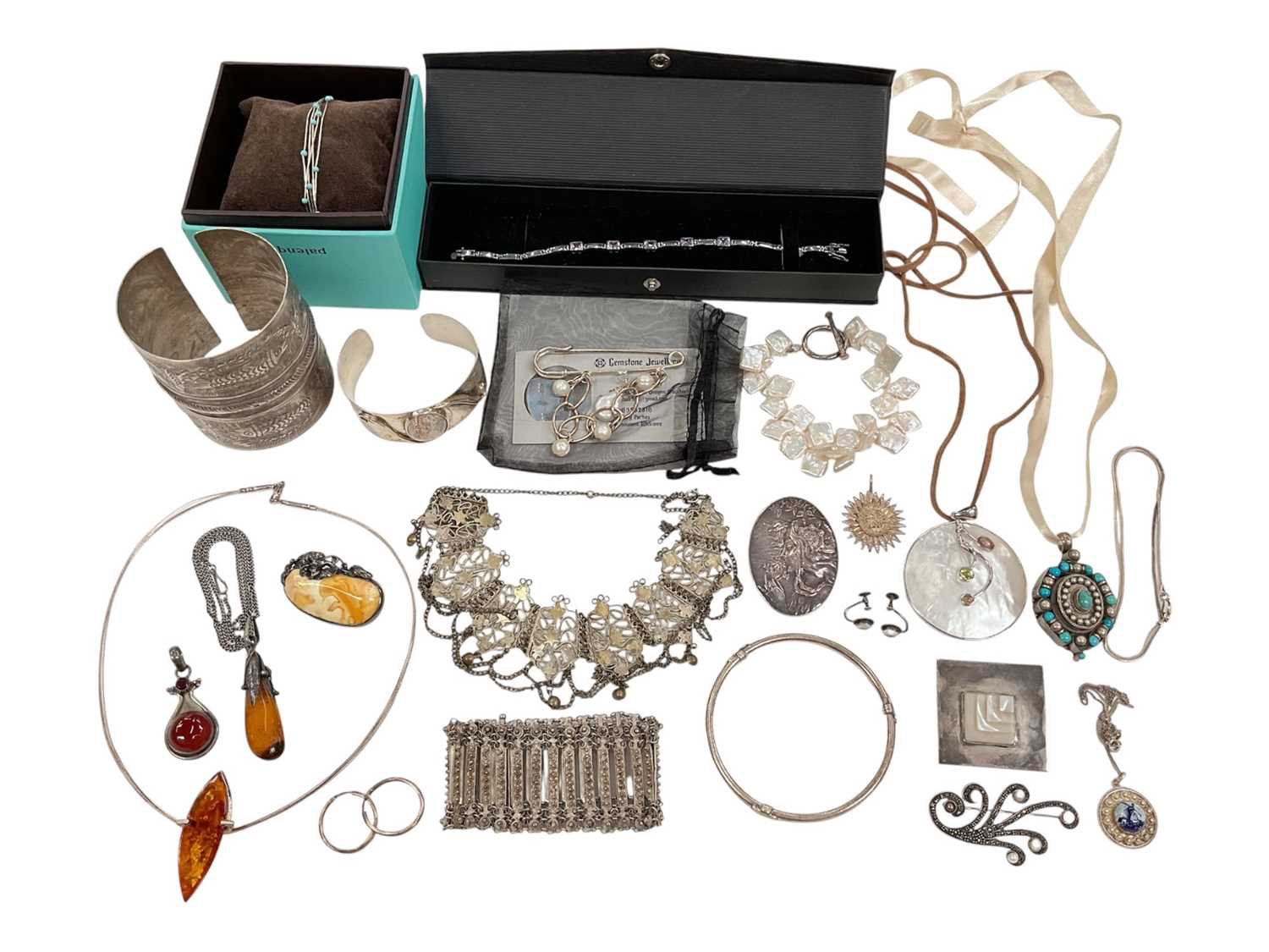 Lot 13 - Group of silver and white metal jewellery including amber pendants, other pendants, bangles, bracelets, brooches etc