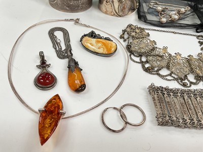 Lot 13 - Group of silver and white metal jewellery including amber pendants, other pendants, bangles, bracelets, brooches etc