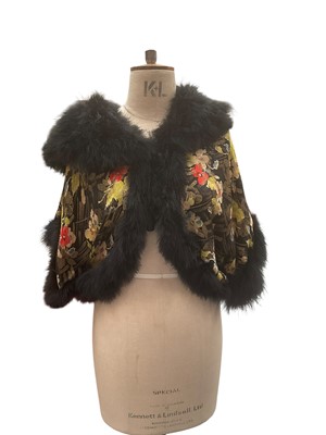 Lot 2520 - 1920s evening bolero, floral design with gold tone metallic thread and black feather edging, centre fastening and braid tassel.