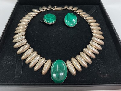 Lot 15 - Silver (925) fringe style necklace with an oval polished malachite pendant, together with a pair of matching clip on earrings