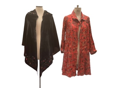 Lot 2522 - 1920s devore velvet evening coat, oriental inspired design of flowers and butterflies on a background of clouds. Sleeves gathered under turn back cuffs and grey silk lining. Plus a 19th century a...
