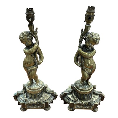 Lot 5160 - Pair of brass Cherub table lamps, 43cm tall