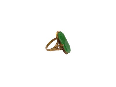 Lot 92 - Chinese yellow metal jade / green hardstone panel ring, stamped 14k, size L