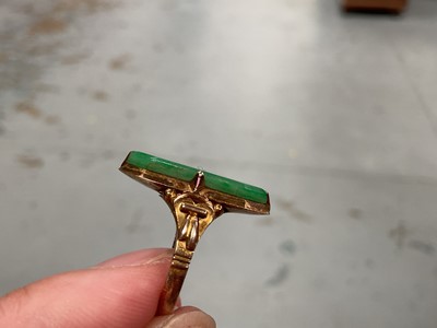 Lot 92 - Chinese yellow metal jade / green hardstone panel ring, stamped 14k, size L