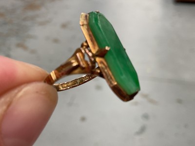 Lot 92 - Chinese yellow metal jade / green hardstone panel ring, stamped 14k, size L