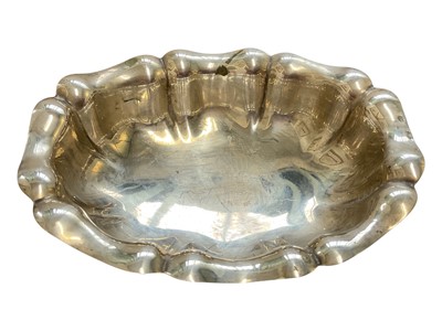 Lot 93 - Continental silver oval dish with scalloped edge and paw feet, stamped 800