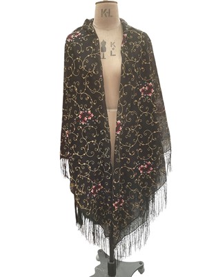 Lot 2525 - 1920s Large black open weave piano shawl with tiny chain stitch hand-embroidered flowers and fringing.