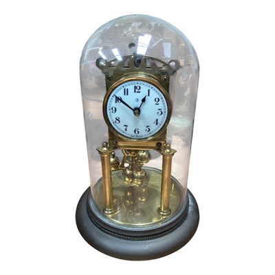 Lot 5167 - German brass pendulum anniversary clock under a glass dome, 28cm total heigh