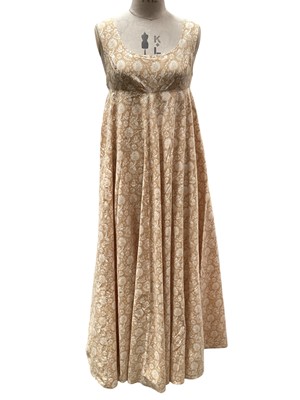 Lot 2529 - Laura Ashley Made in Wales 1960s / 70s sleeveless maxi dress, empire waistline, cotton heraldic print.