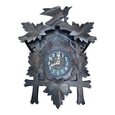 Lot 5171 - Swiss Baumann carved wood wall clock, together with a Swiss cuckoo clock, both with weights (2)