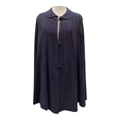 Lot 2531 - 1930s navy wool nurses' cape with silk lining printed 'Queen Mary' in modernist style.