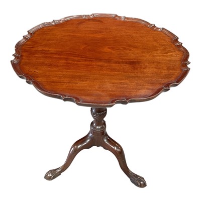 Lot 1383 - George III mahogany dished top tripod table