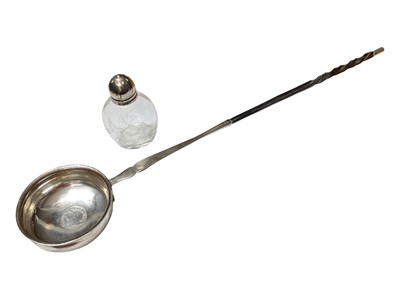 Lot 17 - Georgian silver toddy ladle with a coin inset and a twisted whalebone handle and a glass pepperette with plated mount (2)
