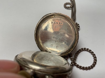 Lot 116 - Continental silver cased fob watch with silver and gilt decorated dial, on a silver watch chain