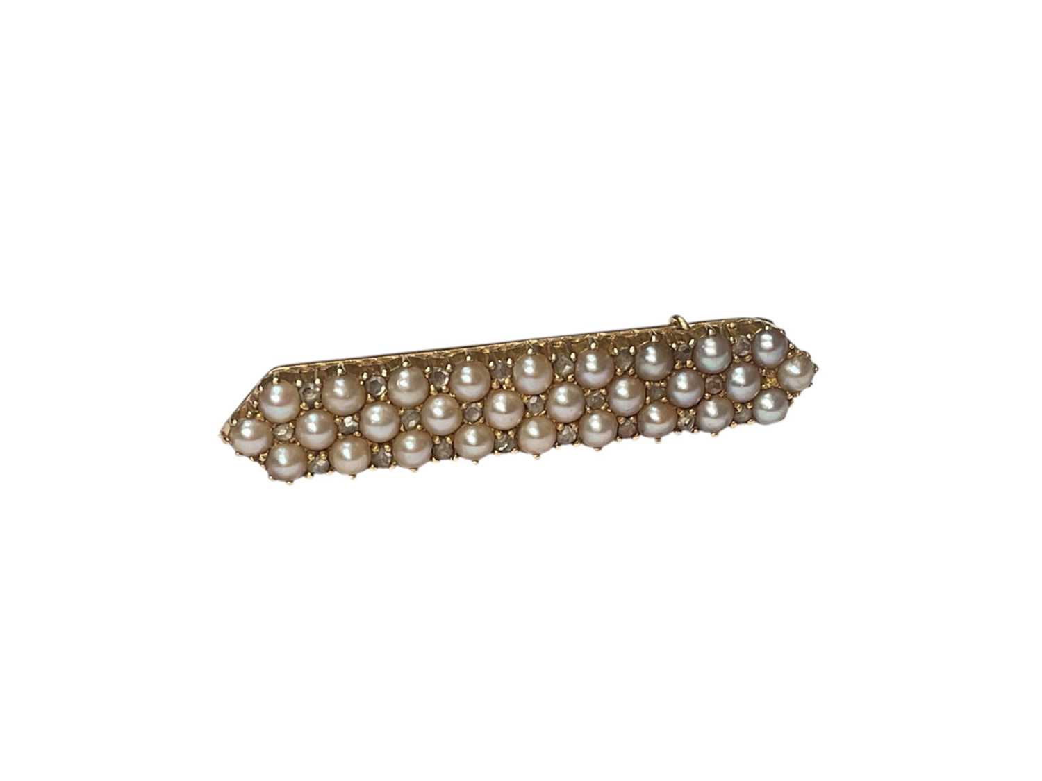 Lot 121 - Edwardian yellow metal seed pearl and rose cut diamond bar brooch, 40mm