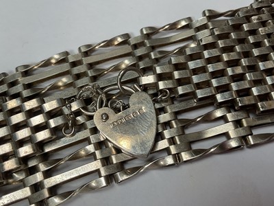 Lot 123 - 1970s silver gate bracelet with padlock clasp