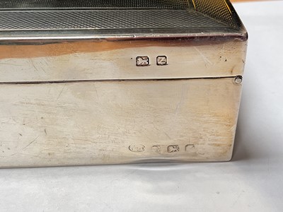 Lot 124 - Silver cigarette box with engine turned decoration and two division wood lined interior containing playing cards (Birmingham 1949), 15.5cm x 11.5cm x 4cm