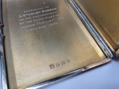 Lot 125 - Two silver cigarette cases, both with engine turned decoration and engraved initials