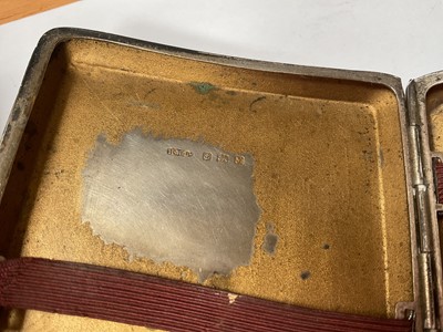 Lot 125 - Two silver cigarette cases, both with engine turned decoration and engraved initials