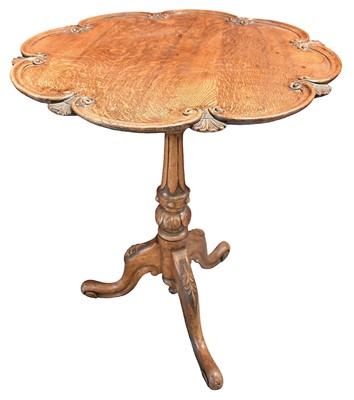 Lot 1416 - Victorian honey oak tripod table with shaped top