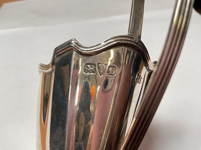 Lot 130 - Victorian silver helmet shaped jug (Chester 1894), 14cm high
