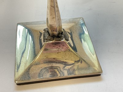 Lot 132 - Edwardian silver cream jug and a 1920s silver two handled trophy with presentation engraving