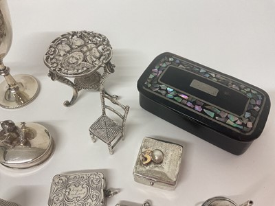 Lot 3 - Group of miniature silver items to include trinket boxes, sovereign case, stamp case in the form of an envelope, Victorian viniagarette, trophies, table and chair ornaments, chamber stick etc, t...