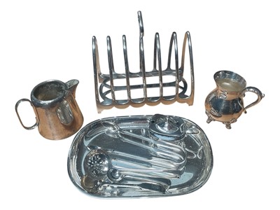 Lot 384 - Group of silver plated items including a large six division toast rack, two cream jugs, pair of sugar tongs etc